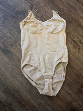 Seamless Beige Shapewear Bodysuit with Built-In Support